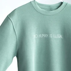 No Human Is Illegal Crewneck -Aurora Style Shop no human is illegal crewneck wear the peace 581877